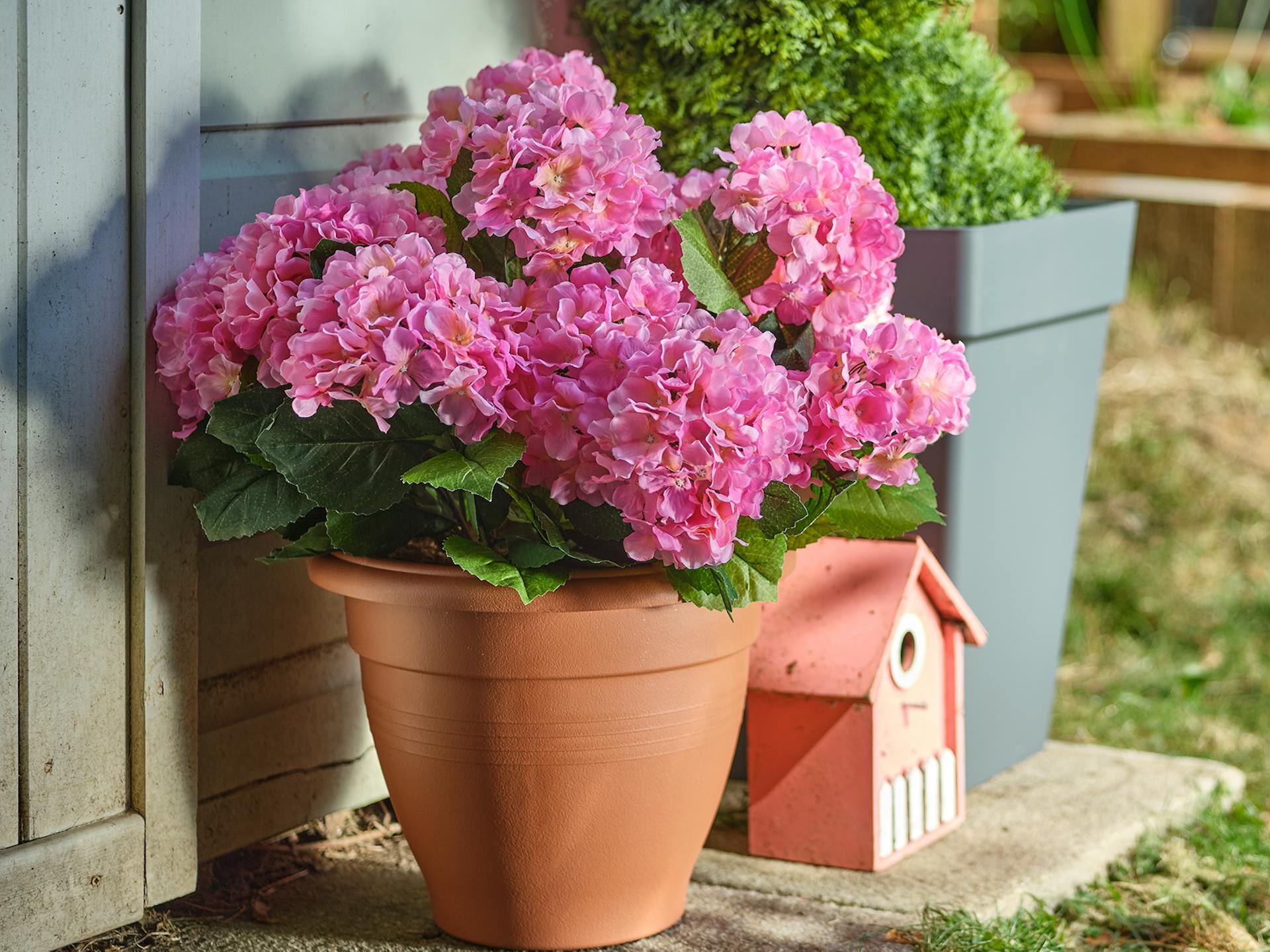 Urban Garden Store -Urban Garden Store faux patio tub in garden